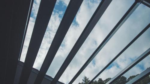 a window of a building looking at the sky at SOKI ATAMI - Vacation STAY 01436v in Atami