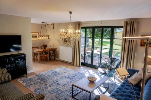 Ruang duduk di Landhaus Storchennest - komfortable Appartements für 2-5 Personen