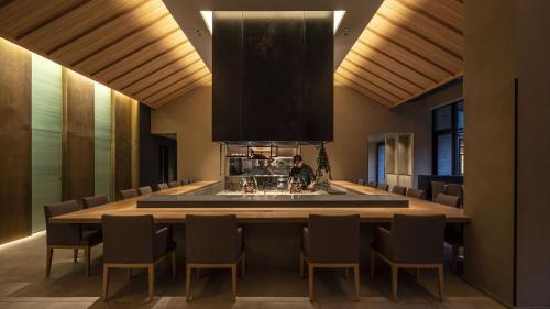 a dining room with a large table and chairs at SOKI ATAMI - Vacation STAY 01361v in Atami