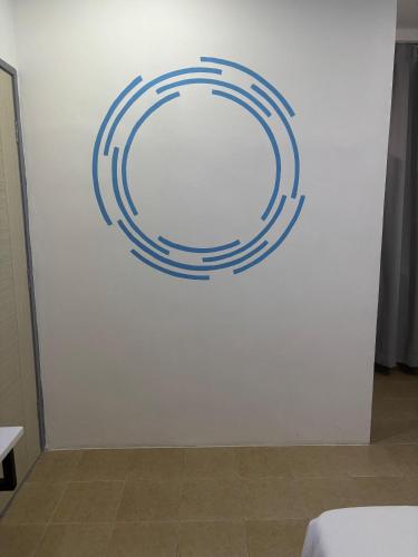 One Stop Hotel Ipohにあるベッド