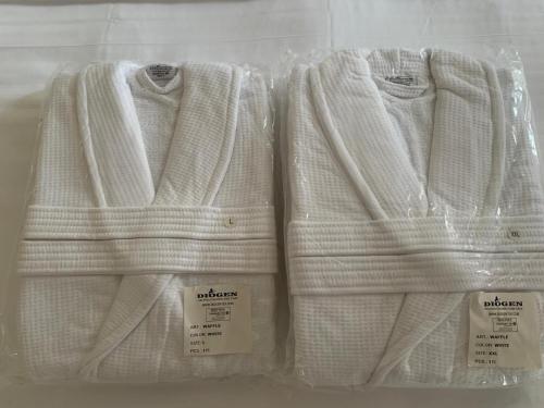 a group of white sweaters in a plastic bag at Diplomat Haven in Sremska Kamenica