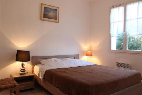 Postel nebo postele na pokoji v ubytování Maison 4 pièces 6 couchages Saint Georges d'Oléron SGO000-094