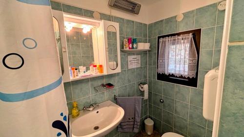 Koupelna v ubytování Viktória Apartman DunaWeekend