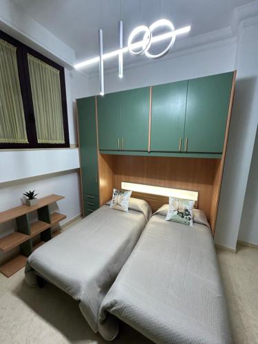 Una cama o camas en una habitación de Matteo Suite Holidays