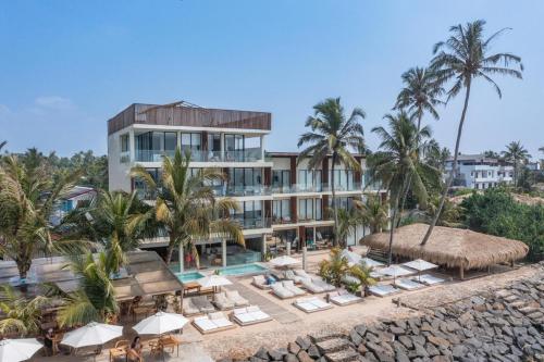 a view of the resort from the beach at The Hotel in Ahangama