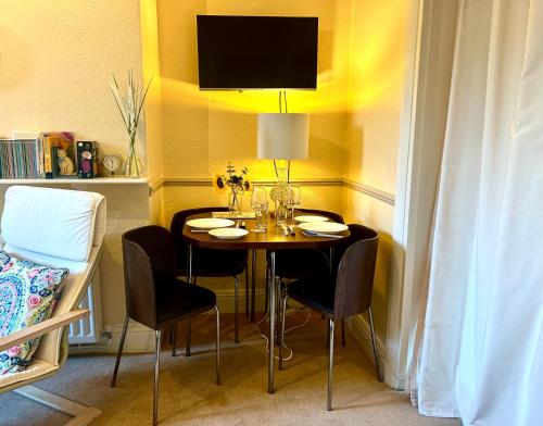 TV a/nebo společenská místnost v ubytování A cozy retreat in the heart of Ilkley