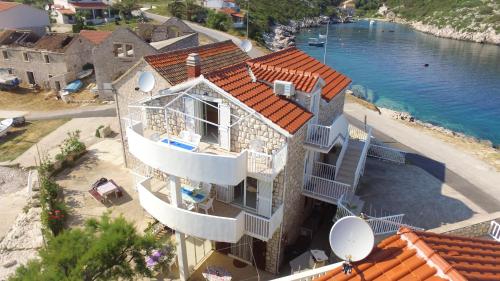 an aerial view of a house on the beach at Apartment Karuza Rukavac in Vis