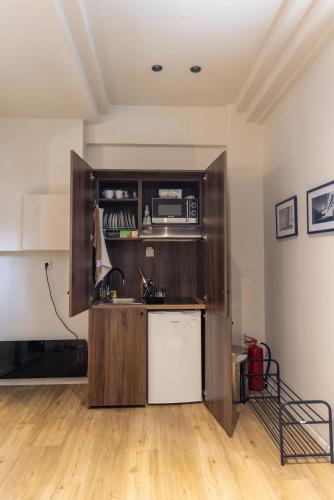 Η κουζίνα ή μικρή κουζίνα στο Trikala mall suites