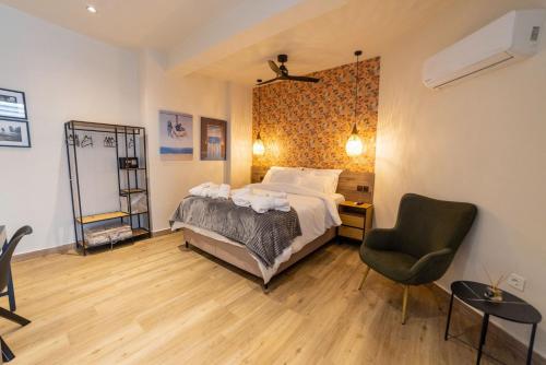 Ένα ή περισσότερα κρεβάτια σε δωμάτιο στο Trikala mall suites