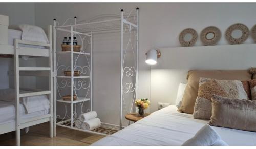 En eller flere senge i et værelse på Apartamentos Venta Lanuza, El Campello