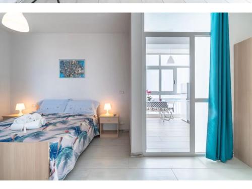 Postel nebo postele na pokoji v ubytování Leverblu House