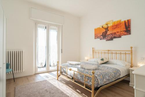 Postel nebo postele na pokoji v ubytování Casa Camilla Bosisio