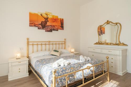 Postel nebo postele na pokoji v ubytování Casa Camilla Bosisio