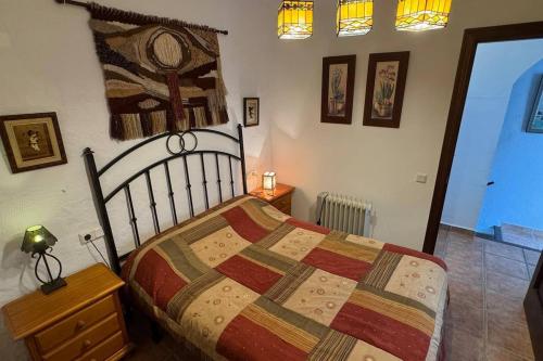 Postel nebo postele na pokoji v ubytování Encanto Rústico Andaluz en el Corazón de Gaucín