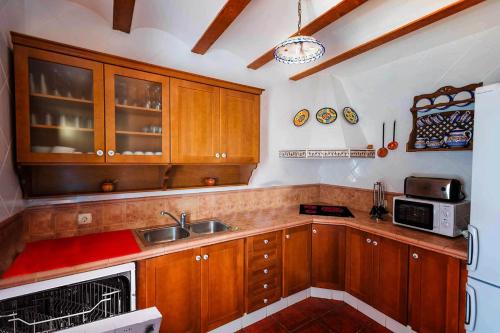 Kuchyň nebo kuchyňský kout v ubytování Casa Rural La Herradura del río Júcar