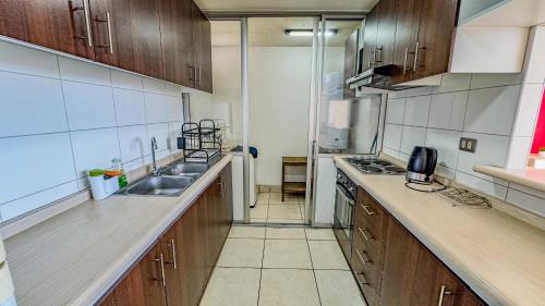 Kuchyň nebo kuchyňský kout v ubytování Condominio Costa Norte