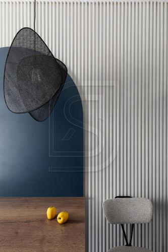a room with a table and a chair and a wall at Diamond by Kristal Collection in Bucharest
