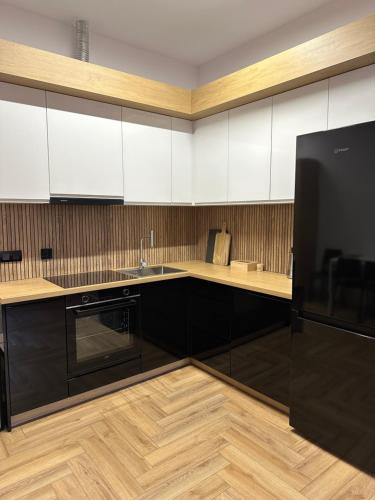 Η κουζίνα ή μικρή κουζίνα στο Apartamenty Center