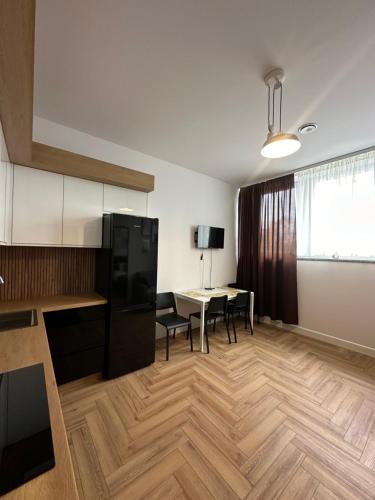 Η κουζίνα ή μικρή κουζίνα στο Apartamenty Center