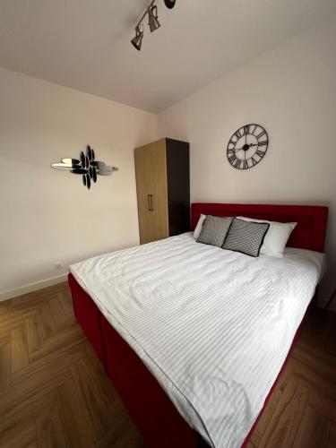 Ένα ή περισσότερα κρεβάτια σε δωμάτιο στο Apartamenty Center