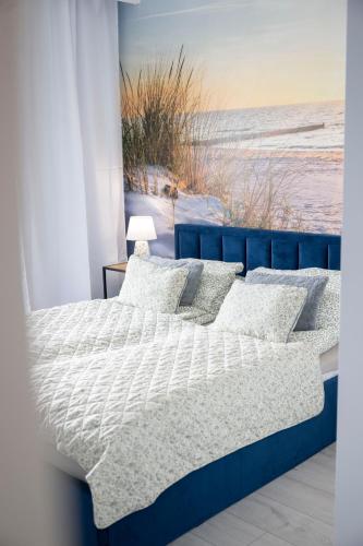 Postel nebo postele na pokoji v ubytování Apartamenty Deluxe