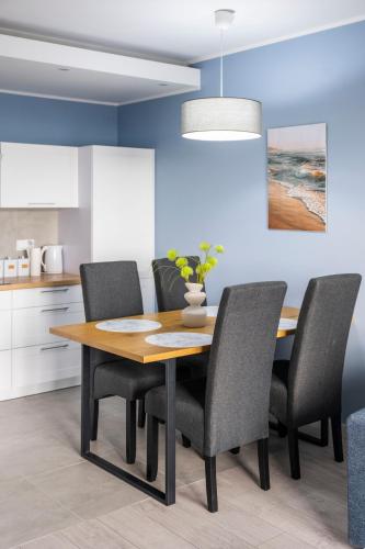 Kuchyň nebo kuchyňský kout v ubytování Apartamenty Deluxe