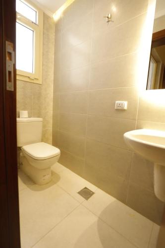 Koupelna v ubytování Sama hotel