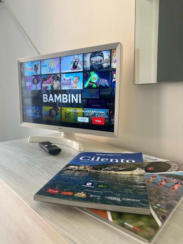 a computer monitor sitting on top of a table at Il Buon Risveglio B&B in Agropoli