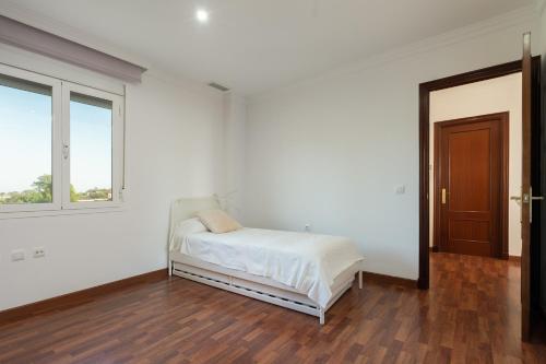 Katil atau katil-katil dalam bilik di Apartoyou - Chalet & Pool
