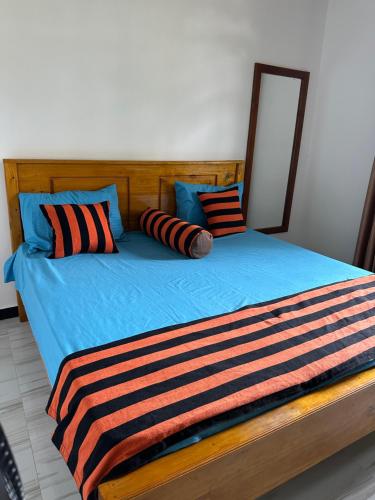 Ένα ή περισσότερα κρεβάτια σε δωμάτιο στο Green field Inn