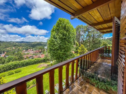 a view from the balcony of a house at Mansão Nacional Inn in Campos do Jordão
