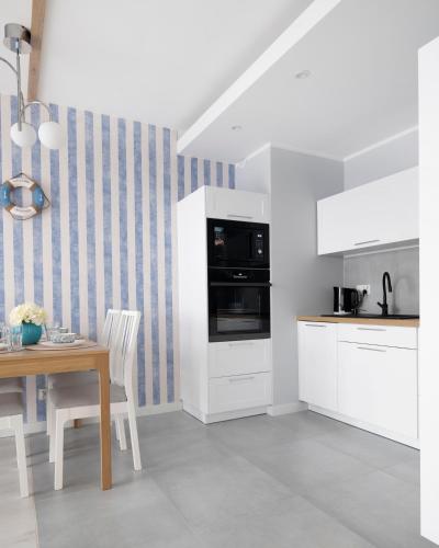 Dapur atau dapur kecil di Kapitański by Go Apart