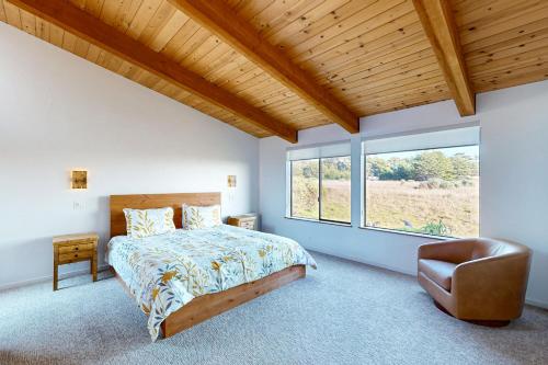 Postel nebo postele na pokoji v ubytování Coffee by the Sea