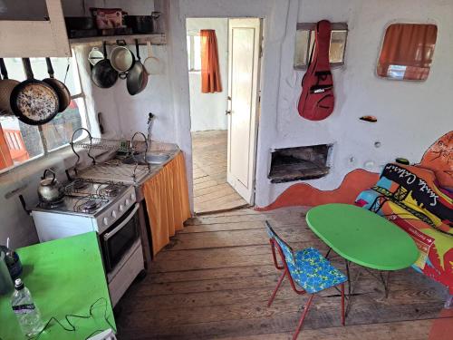 Kuchyň nebo kuchyňský kout v ubytování Baubo Ecocasa