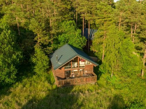 an overhead view of a log cabin in the woods at Strathyre, Ben Ledi Cabins - Forest Holidays in Callander