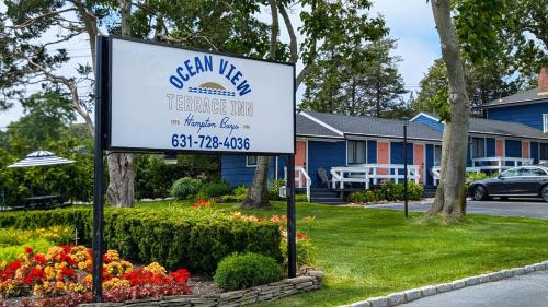 a sign in front of a house at Ocean View Terrace in Hampton Bays