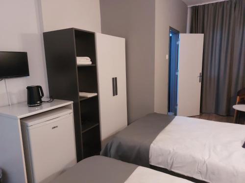 Lighthouse Suites by HolidayKeysにあるベッド