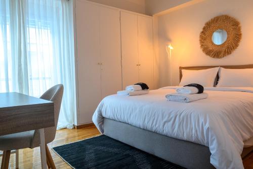 Ένα ή περισσότερα κρεβάτια σε δωμάτιο στο EfZin cozy house, Patras center