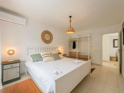 Ένα ή περισσότερα κρεβάτια σε δωμάτιο στο Villa Fontana
