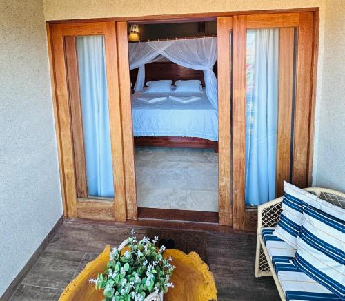 En eller flere senge i et værelse på Casa Estrela Luz - Xandó - Caraiva