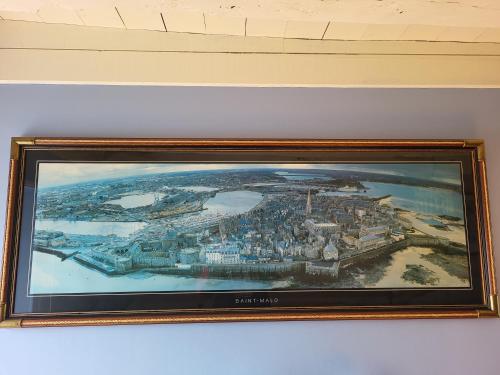 a picture of a painting of a city at Clos St Ange (Dinan-St Malo) in Vildé-Guingalan