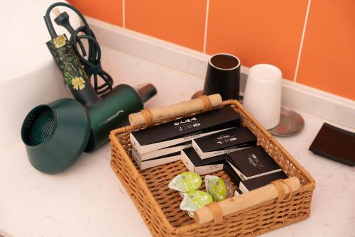 a basket on a counter with some food in it at Yun Guan Shunde Renjia Resort Hotel in Jinghong