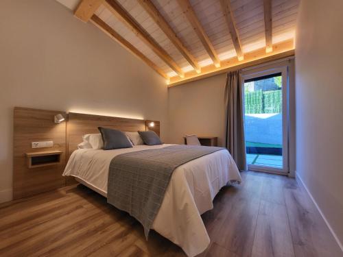 Ένα ή περισσότερα κρεβάτια σε δωμάτιο στο Apartamentos Las Terrazas de Suances