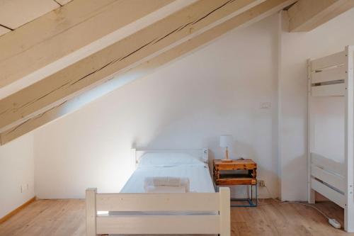 Ένα ή περισσότερα κρεβάτια σε δωμάτιο στο Tomato Backpackers