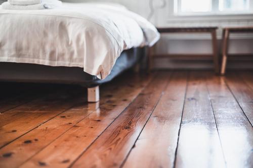 Una cama o camas en una habitación de Mundekulla