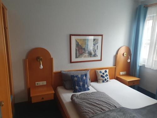 Postel nebo postele na pokoji v ubytování Gasthaus Krone