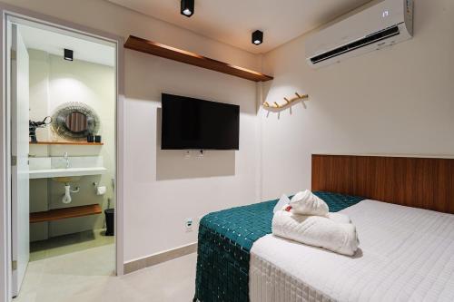 Ένα ή περισσότερα κρεβάτια σε δωμάτιο στο Casa Naluum Miracles