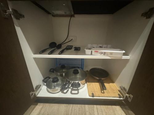 Kuchyň nebo kuchyňský kout v ubytování Estudio amueblado en Ophelia Tulum