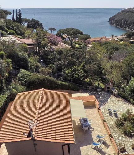 an image of a house with a view of the ocean at Rosa dei Venti Est in Capoliveri