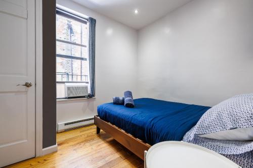 Katil atau katil-katil dalam bilik di Discover the Comfort of Columbia University Area-1